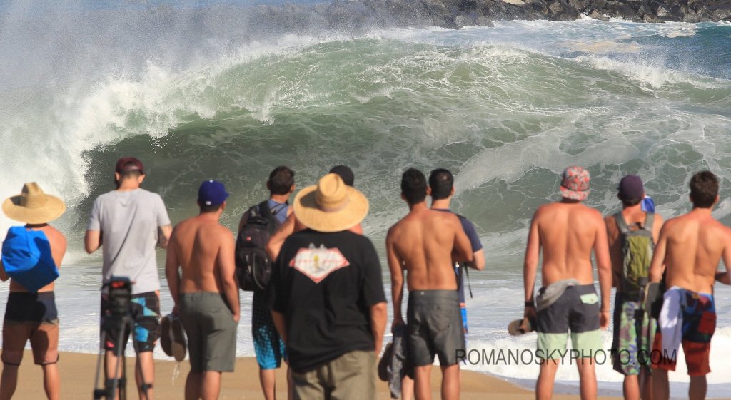 Thick... nasty... hollow... and rideable.  Trick with one like this is catching it where it’s catchable.  An added pleasure: not witnessing the clutter of water snappers usually populating and polluting the wave’s fore’water’.  Catching the crowd in this shot was intentional.