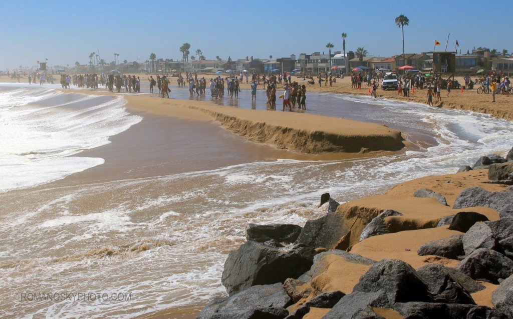 The swell, although not an all-timer, had an inordinate amount of push as the tide filled in on the 6th.  The great amount of water constantly refilling the depression behind the berm resulted in the largest pond and “river” many long-time Wedge people have ever witnessed.  The rapids had small standing waves that were even rideable on boogies.  Everyone, save those who got drenched, lost belongings or got their cameras ruined, enjoyed this face of Wedge.  