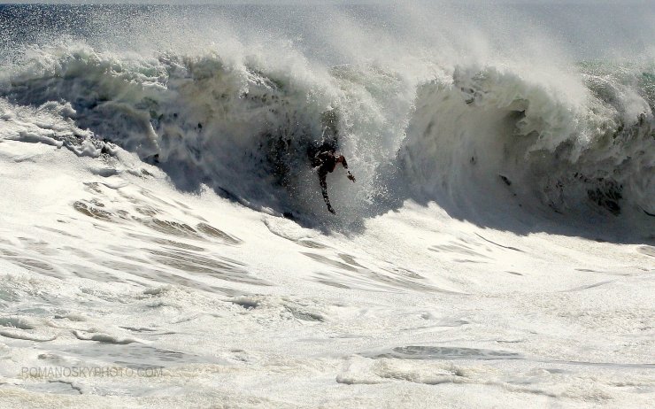 Not a big wave, but a rare right.  The lighting and white water dramatize the image some.  Rider ?