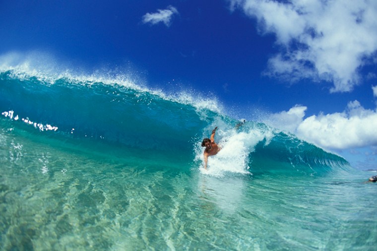 Daren Crawford bodysurfing at Pupukea.