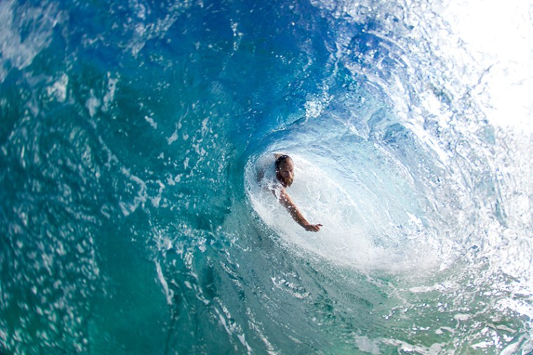 Keith Malloy bodysurfing at Pupukea. 
