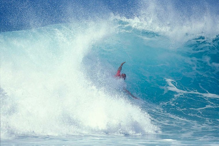 Kelly Slater during a Pipeline bodysurf competition. 